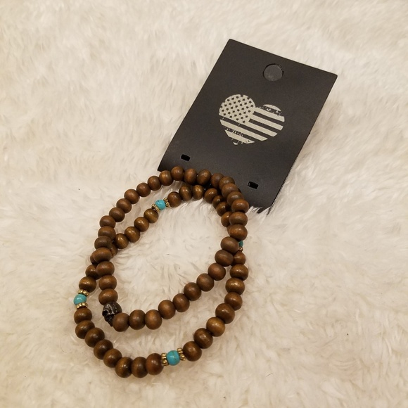 Brandy Melville Jewelry - Brandy Melville Wood Turquoise Skull Boho